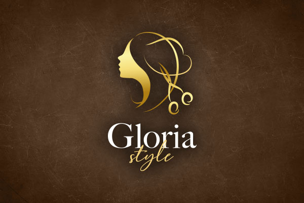logo parrucchiera bianco e oro su sfondo marrone scuro